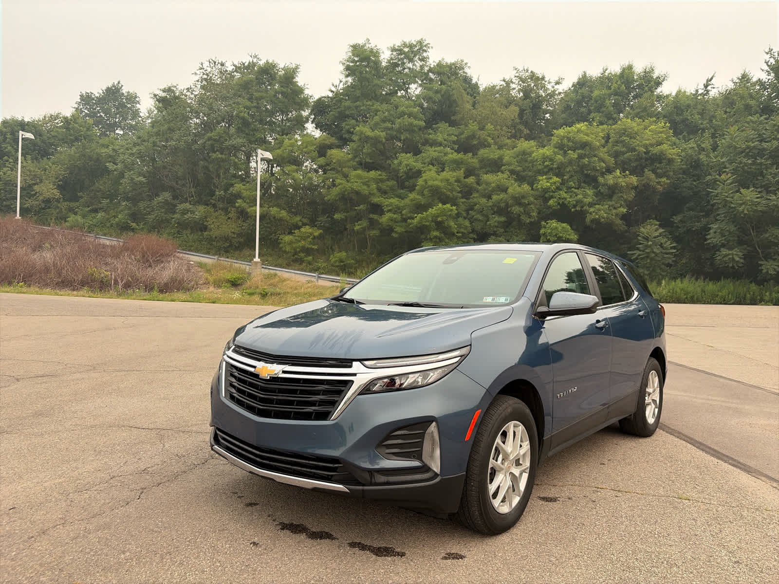 Used 2024 Lakeshore Blue Metallic Chevrolet LT image 1