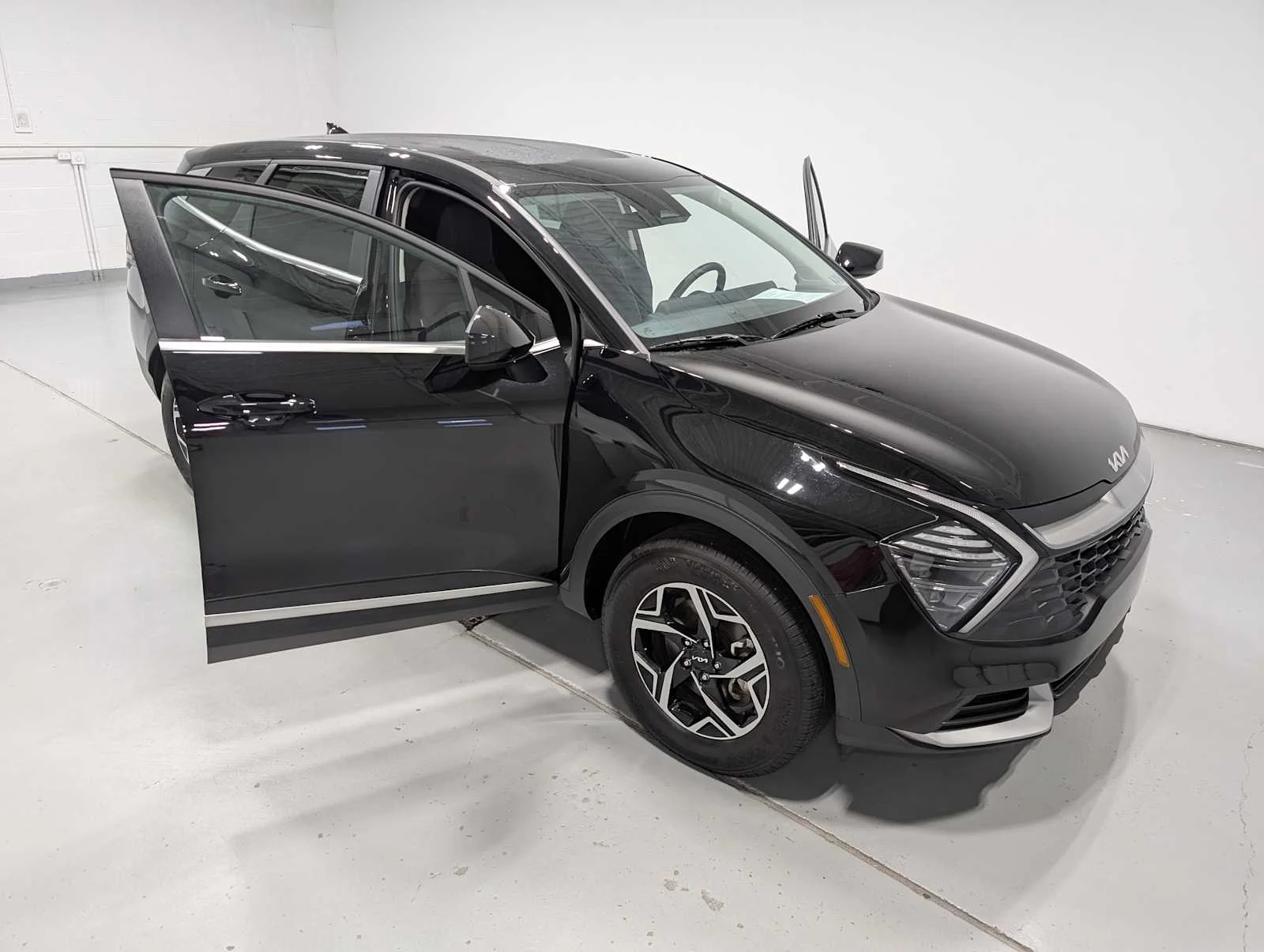 Used 2025 Ebony Black Kia LX image 16
