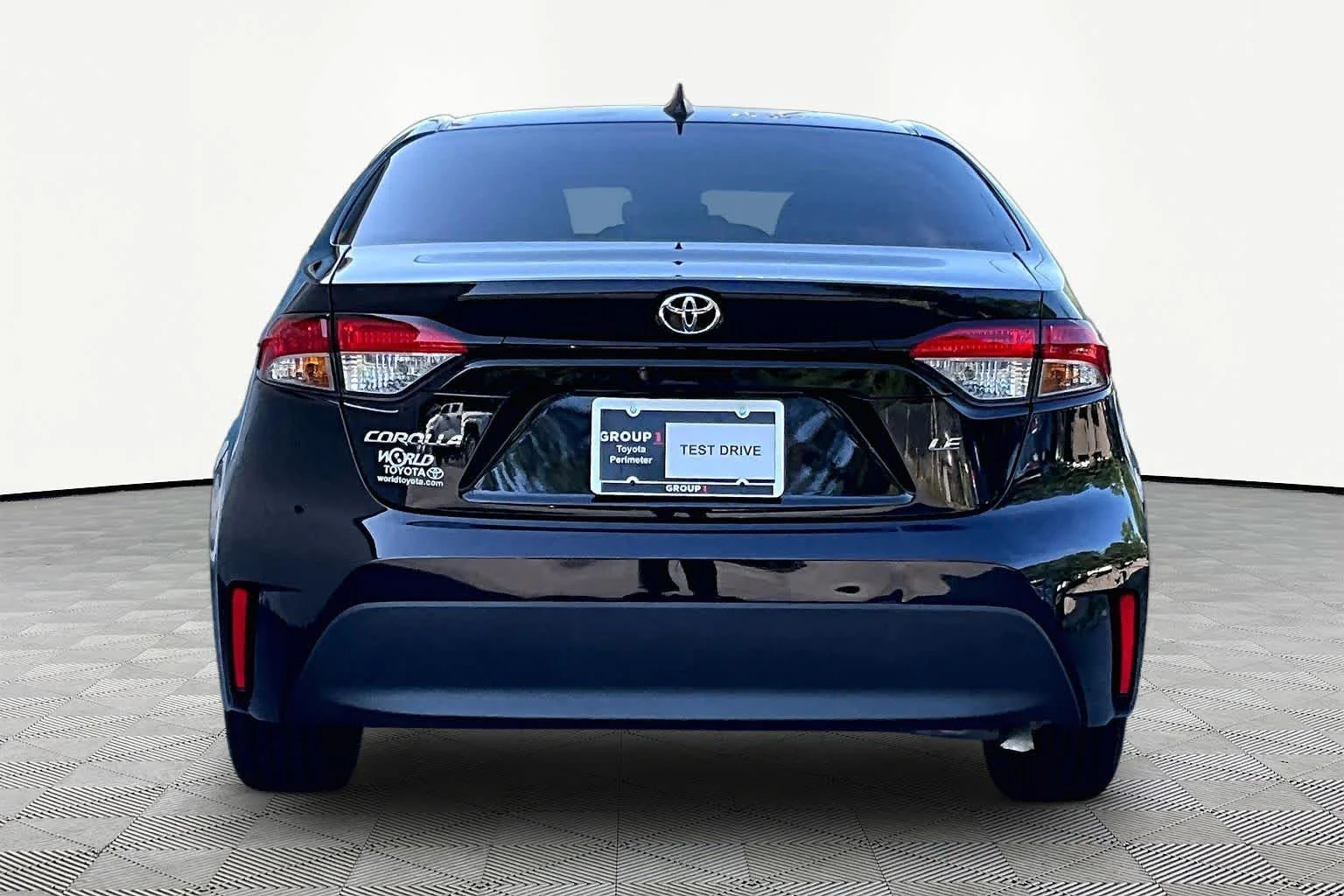 Used 2025 Midnight Black Metallic Toyota LE image 9