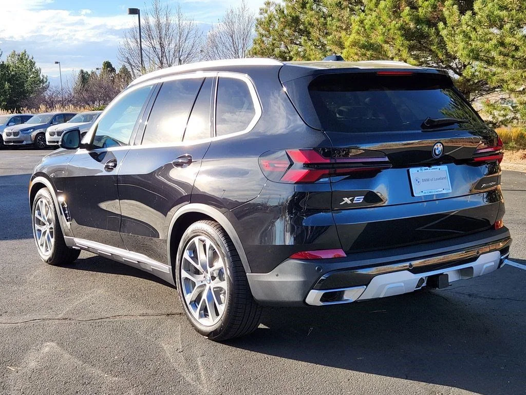 Used 2026 Black Sapphire Metallic BMW xDrive50e image 3
