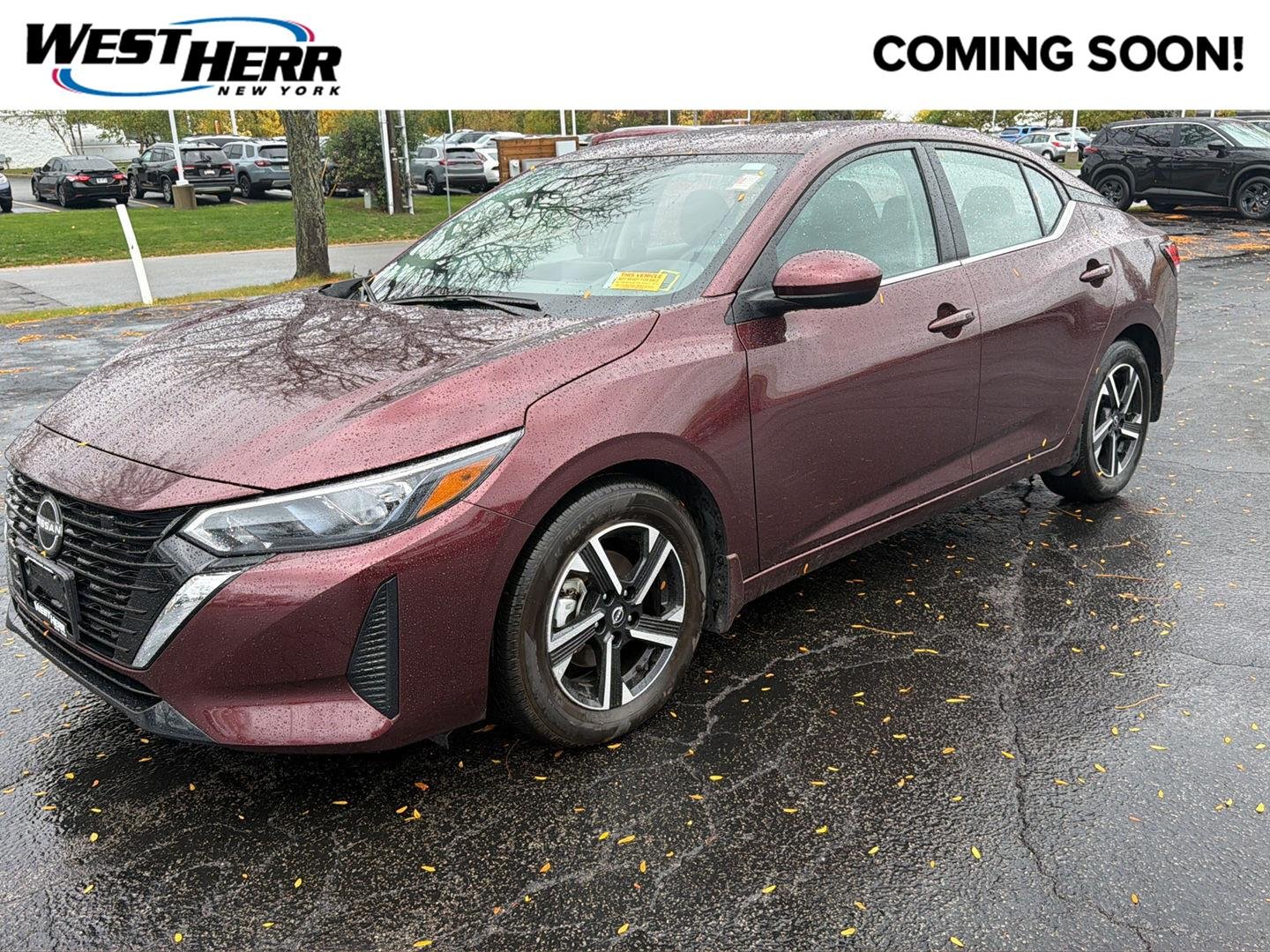 Used 2024 Rosewood Metallic Nissan SV image 1