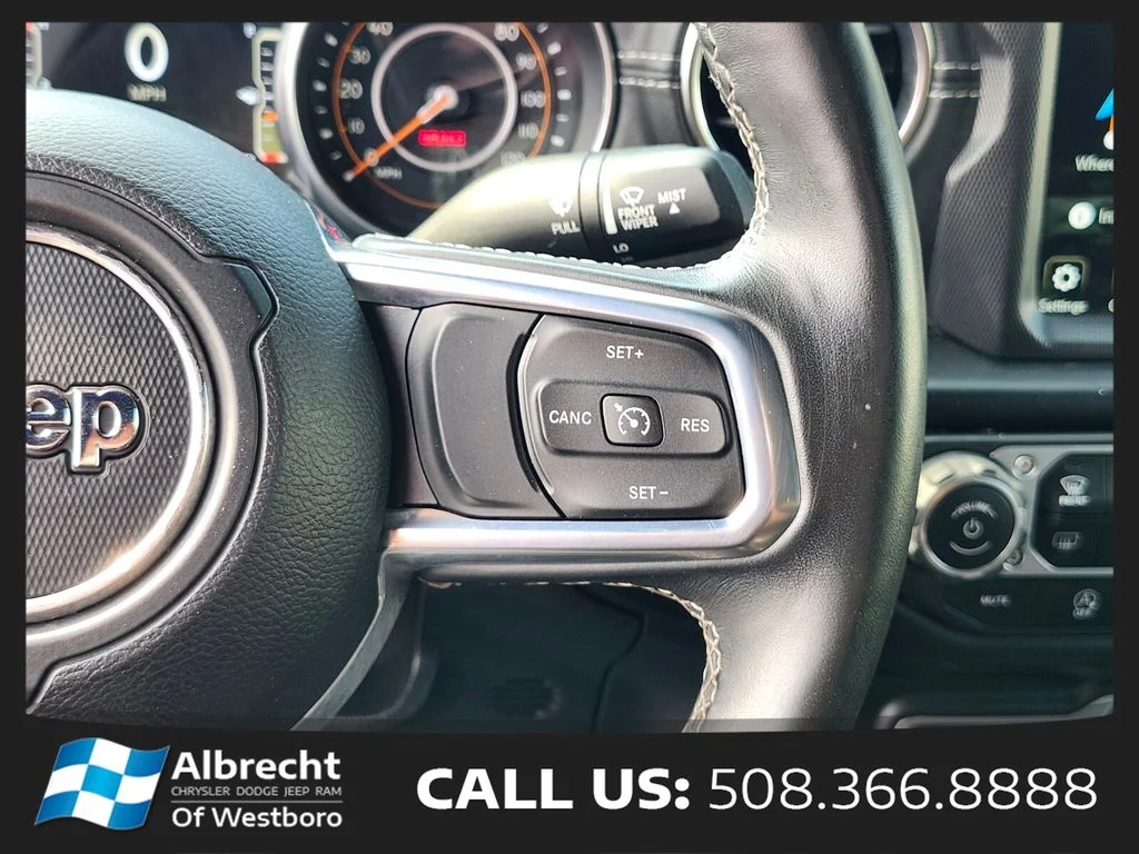 Used 2020 Orange Jeep Unlimited Sahara image 29