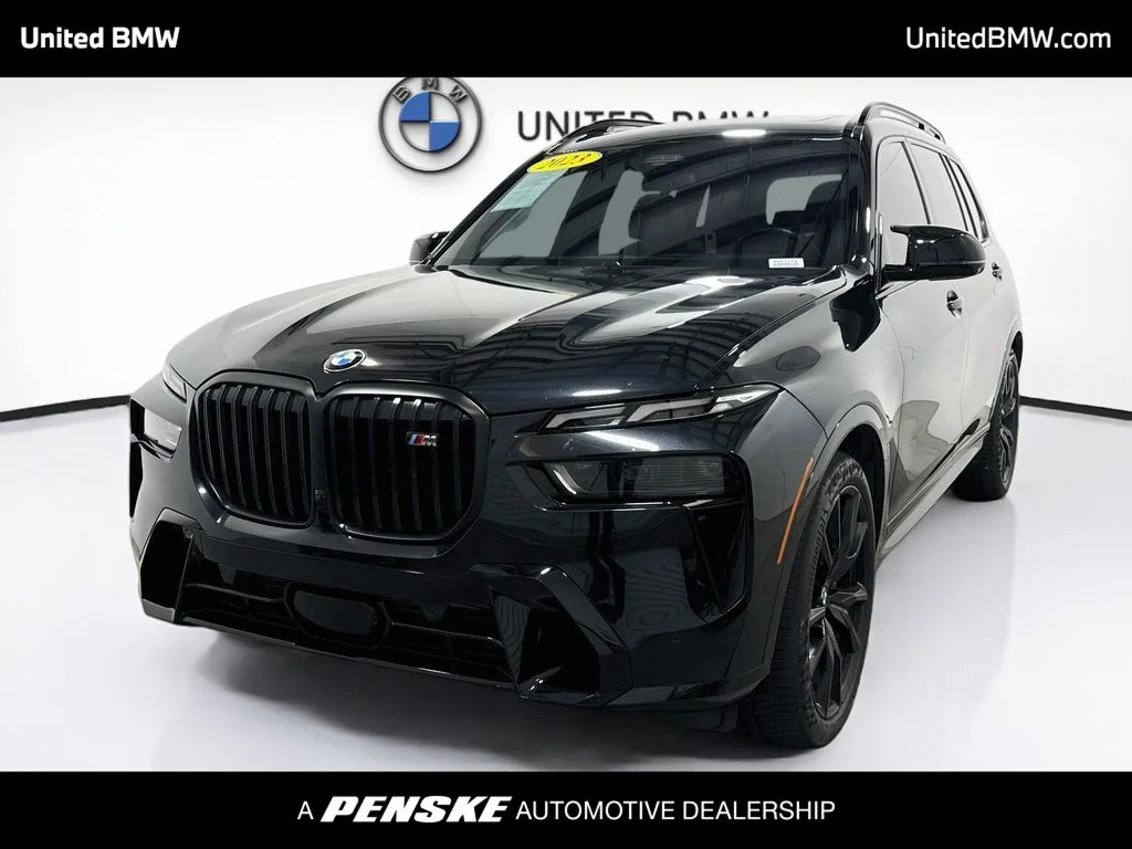Used 2023 Black Sapphire Metallic BMW M60i image 1