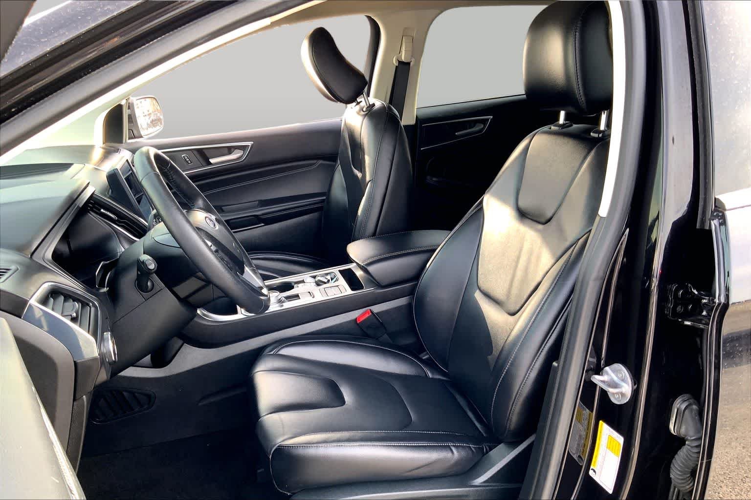 Used 2022 Agate Black Metallic Ford Titanium image 8