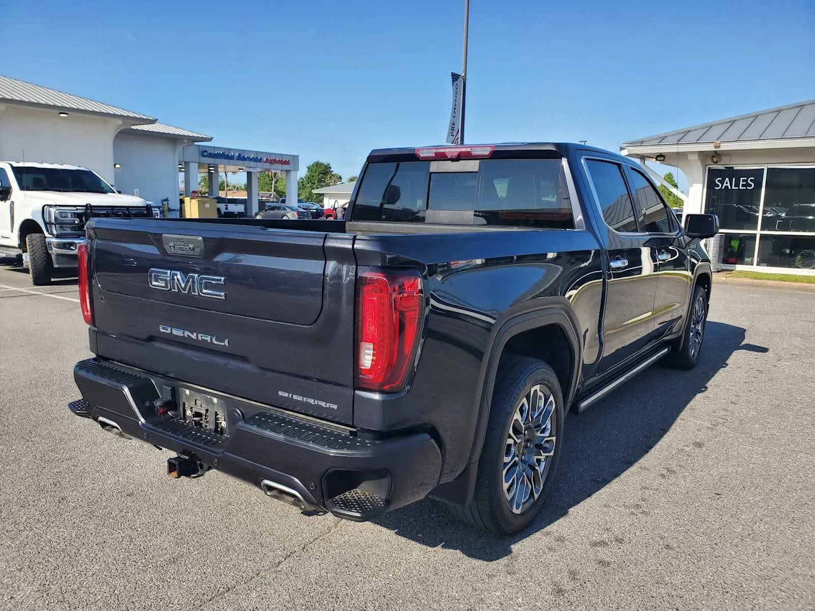 Used 2023 Titanium Rush Metallic GMC Denali Ultimate image 3