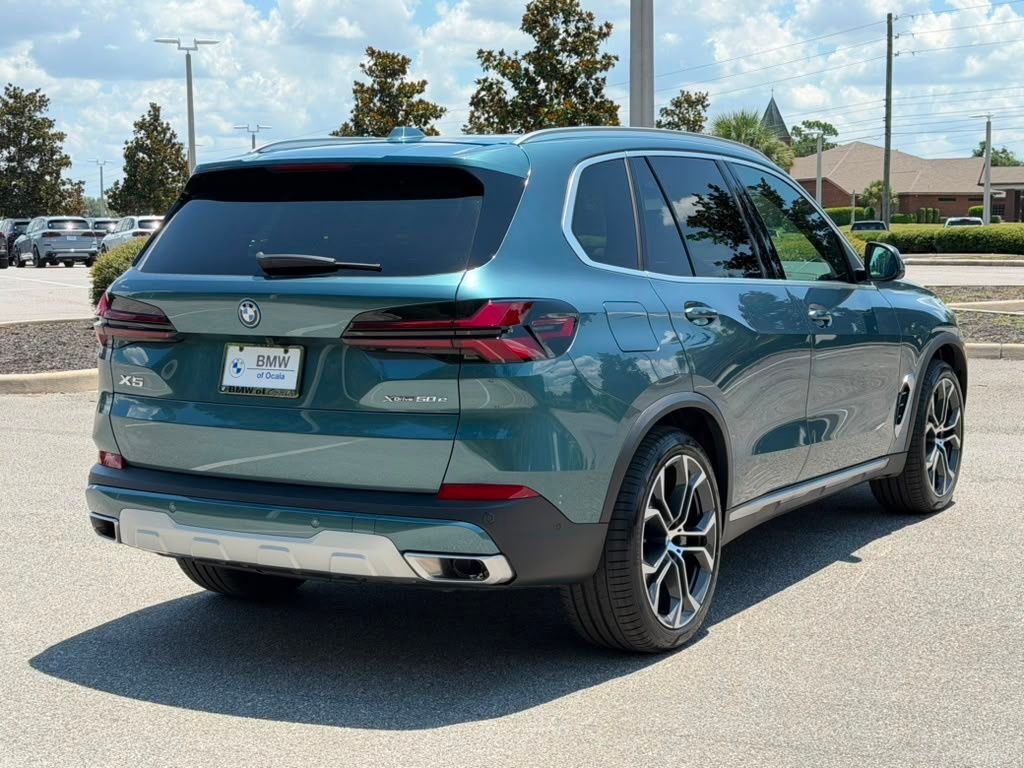 Used 2026 Blue BMW xDrive50e image 5