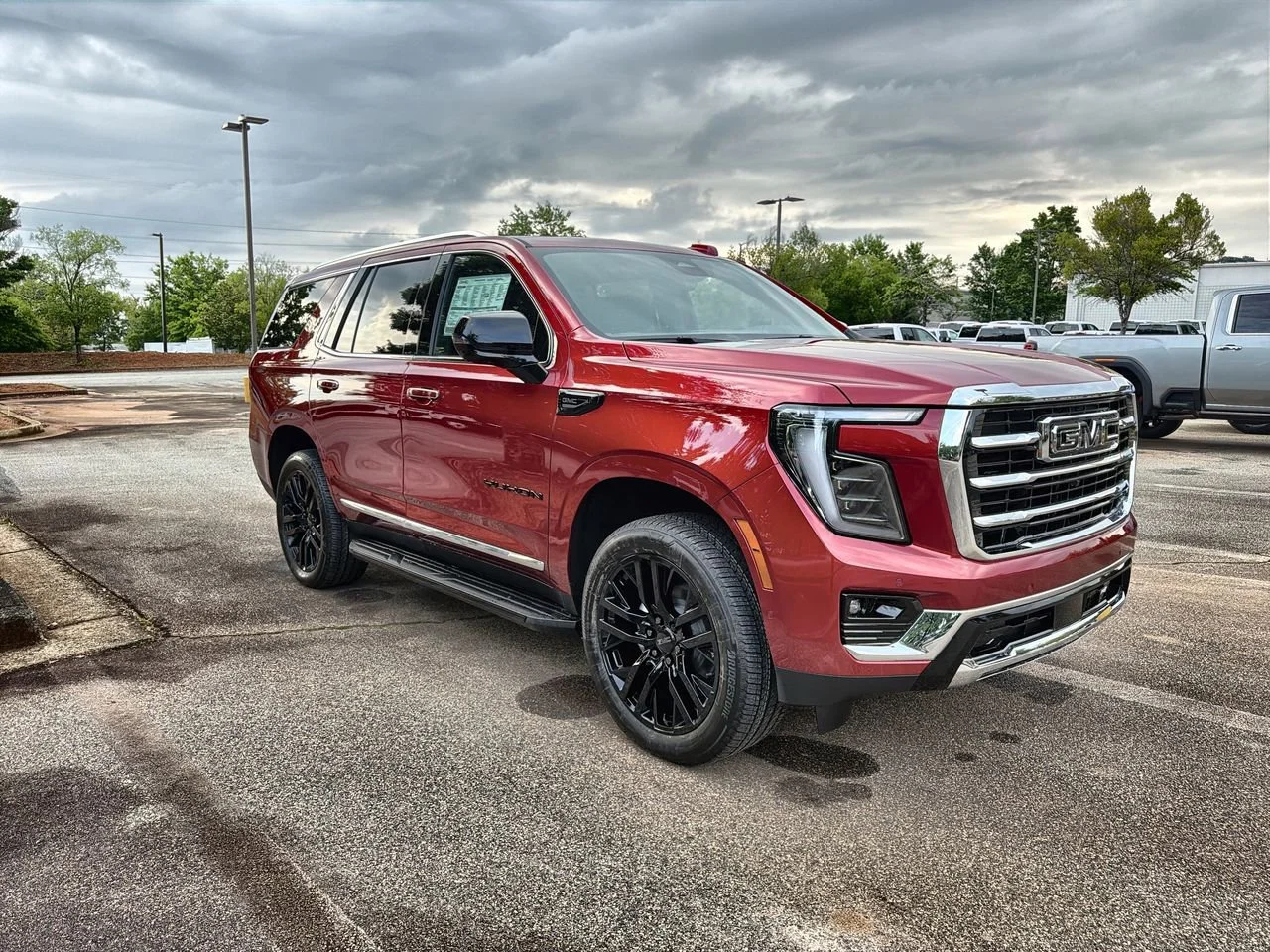 New 2026 Volcanic Red Tintcoat GMC Elevation image 2