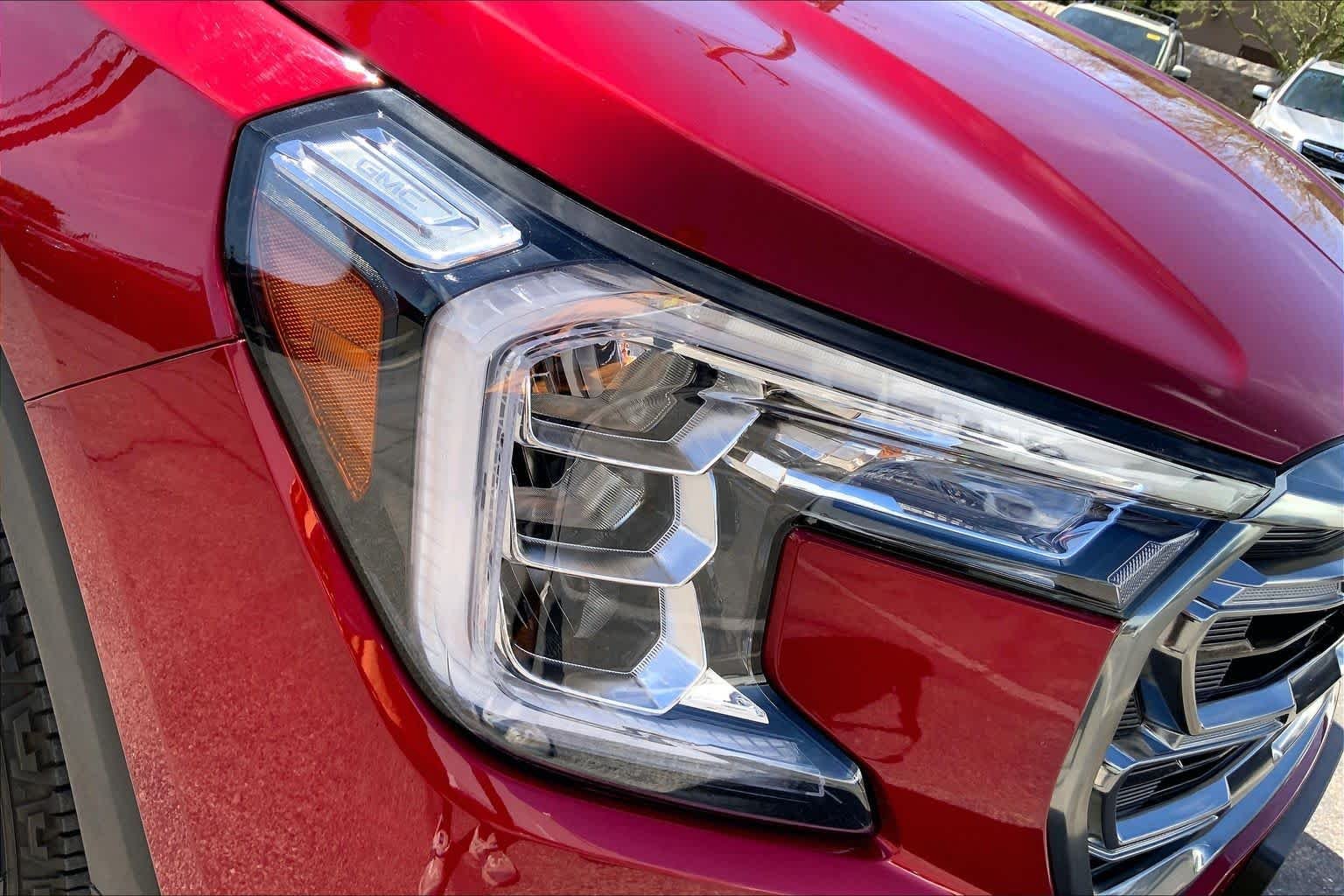 Used 2024 Volcanic Red Tintcoat GMC AT4 image 25