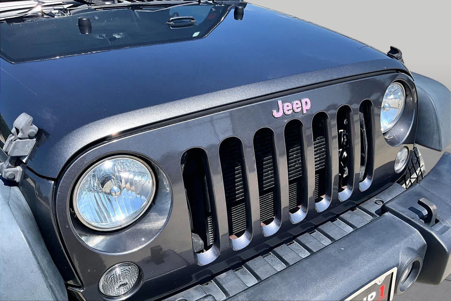 Used 2018 Granite Crystal Metallic Clearcoat Jeep Sport S image 26