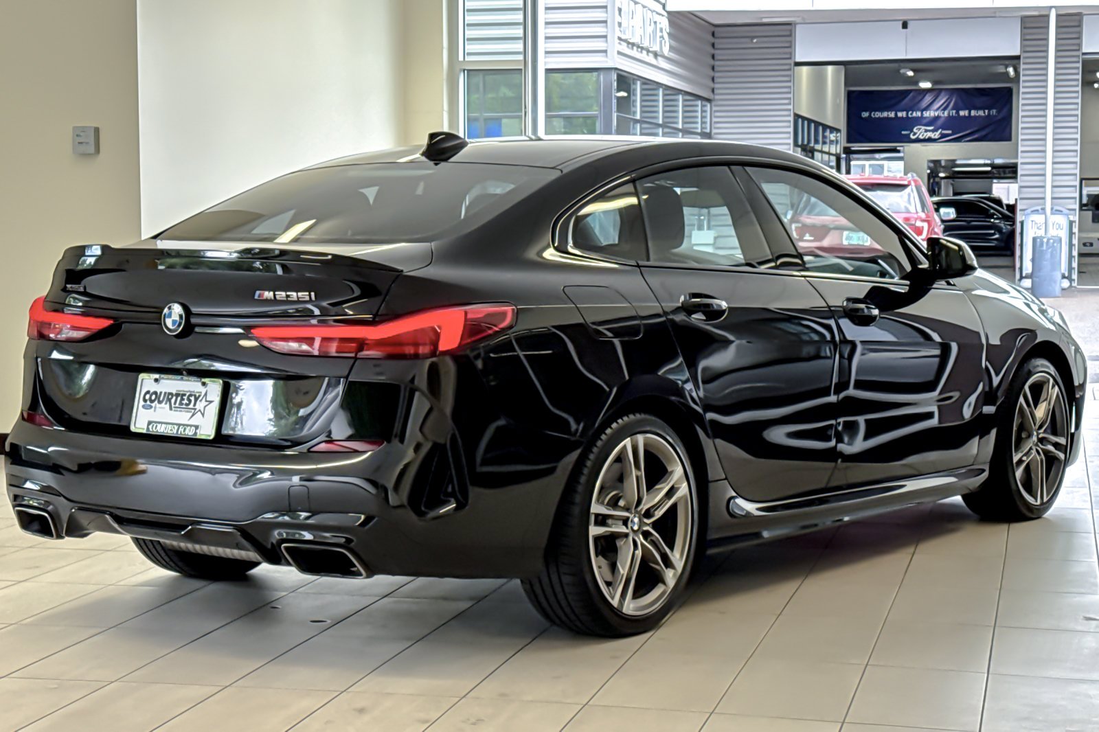 Used 2020 Black Sapphire Metallic BMW M235i xDrive image 4
