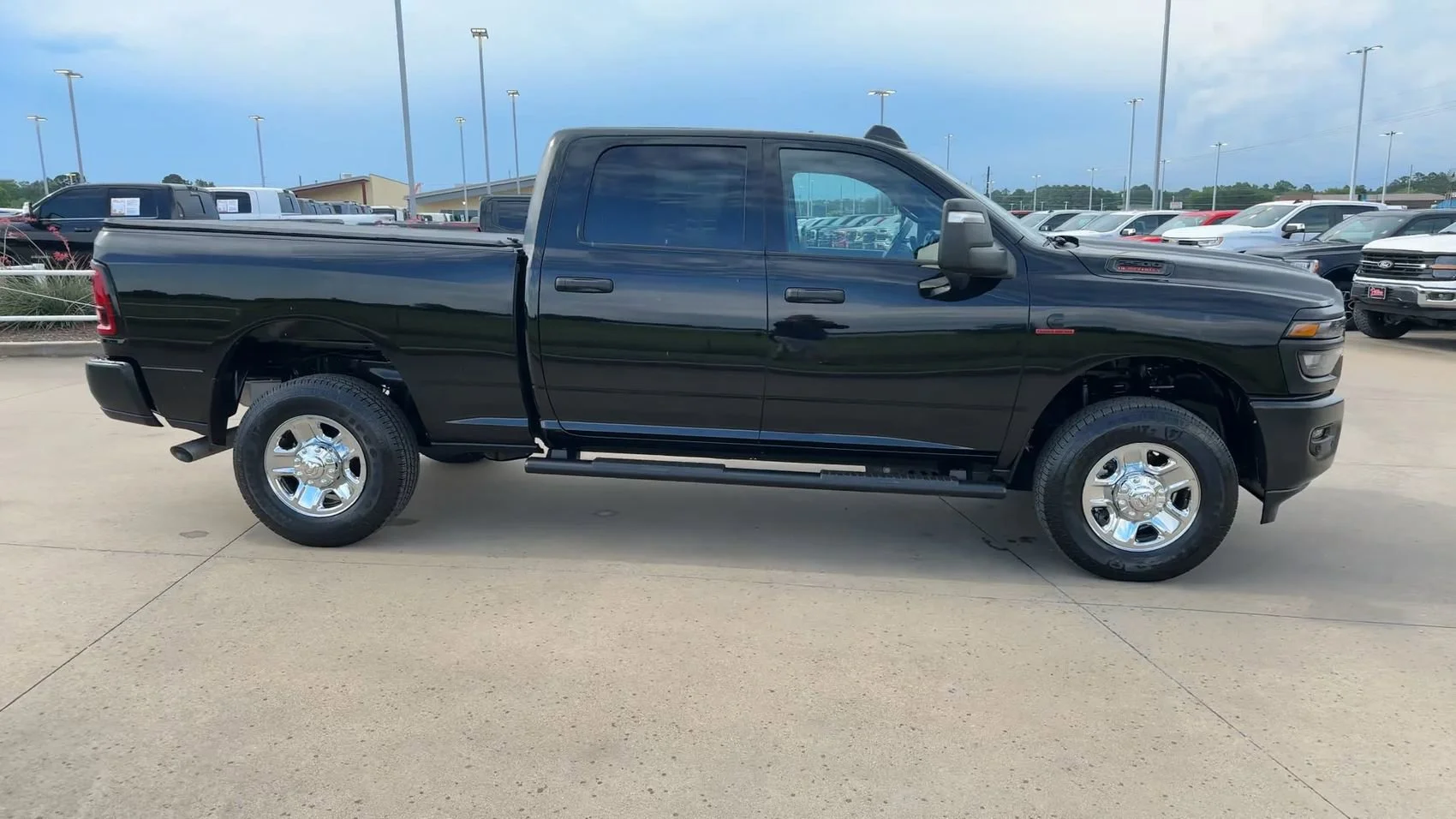Used 2025 Diamond Black Crystal Pearlcoat Ram Tradesman image 2