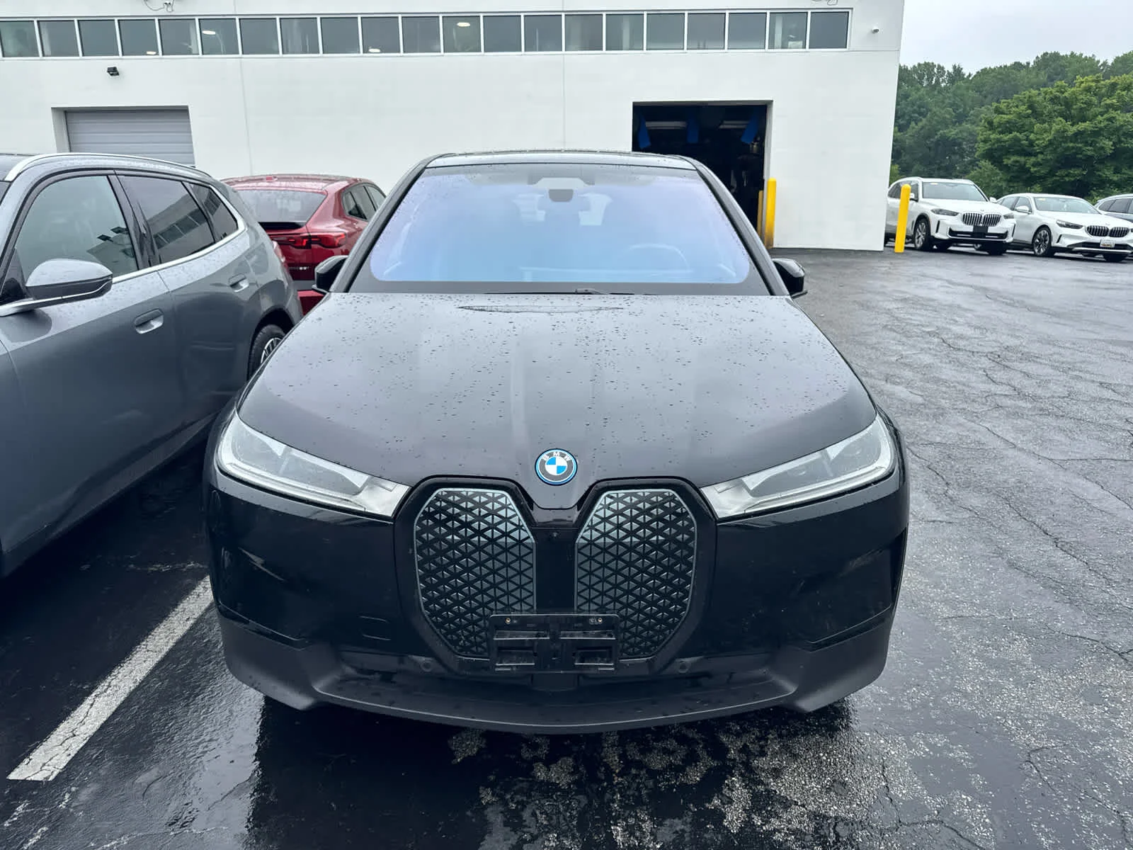 Certified Used 2024 Black Sapphire Metallic BMW xDrive50 image 2