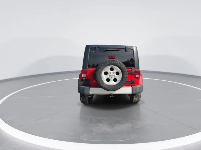 Used 2014 Red Jeep Unlimited Sahara image 9