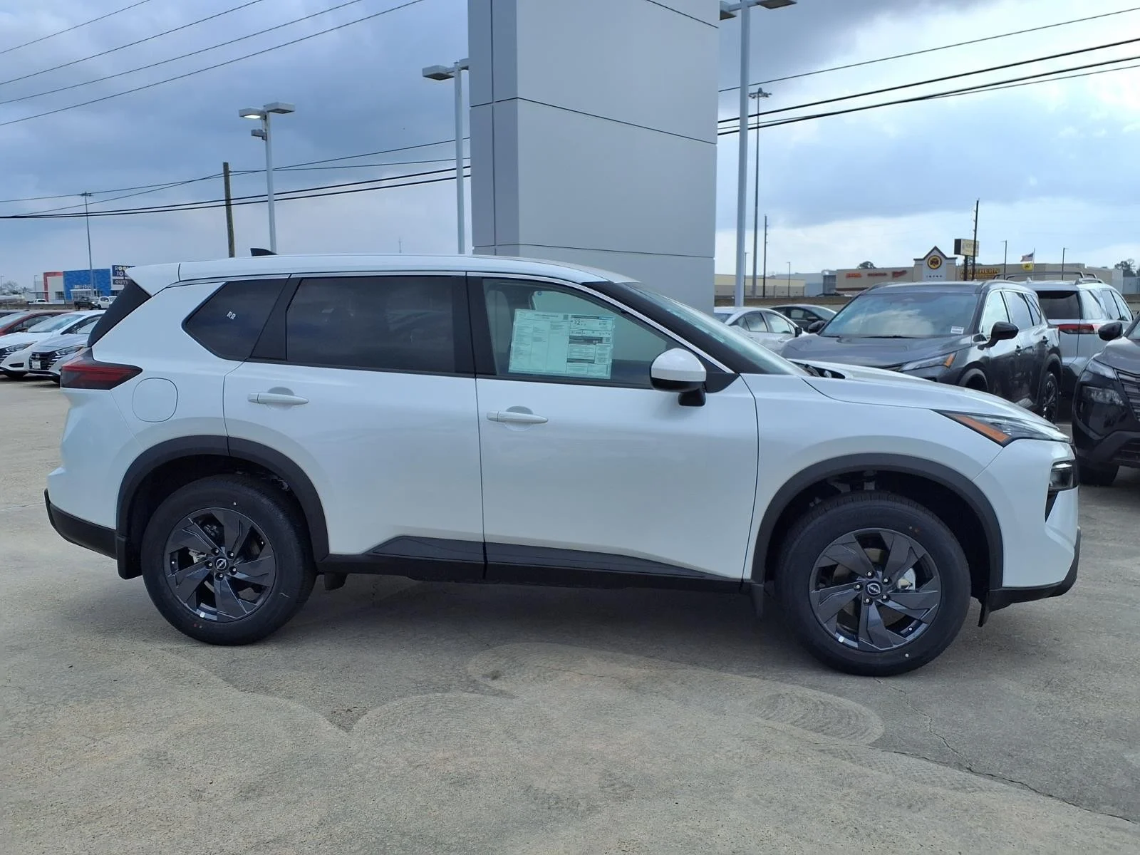 2026 Nissan Rogue SV White at Robbins Nissan