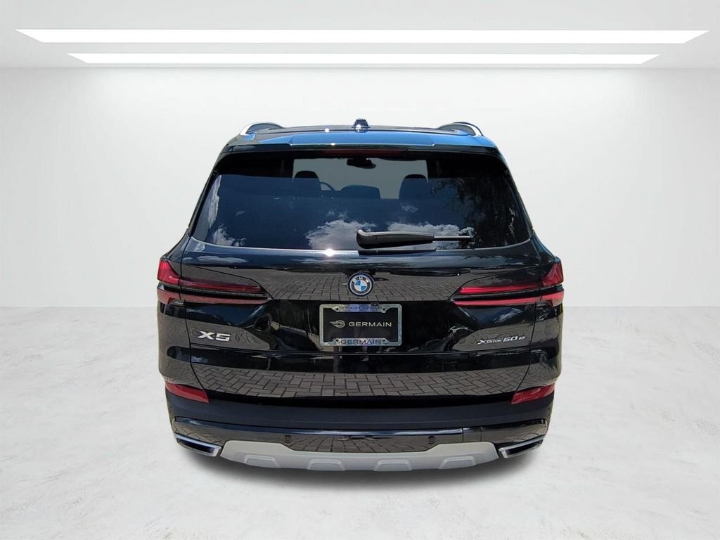 New 2026 Black Sapphire Metallic BMW xDrive50e image 5