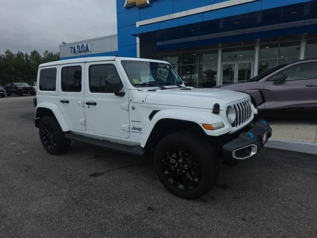 Used 2024 White Jeep Sahara 4xe image 1