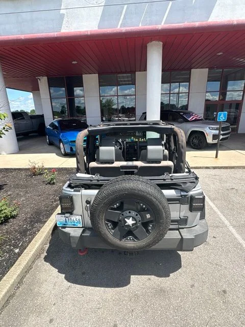 Used 2010 Silver Jeep Sport image 6