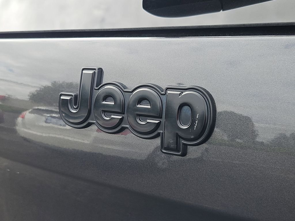 Used 2016 Granite Crystal Metallic Clearcoat Jeep Sport image 25