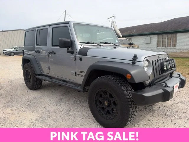 Used 2016 Silver Jeep Unlimited Sport image 1