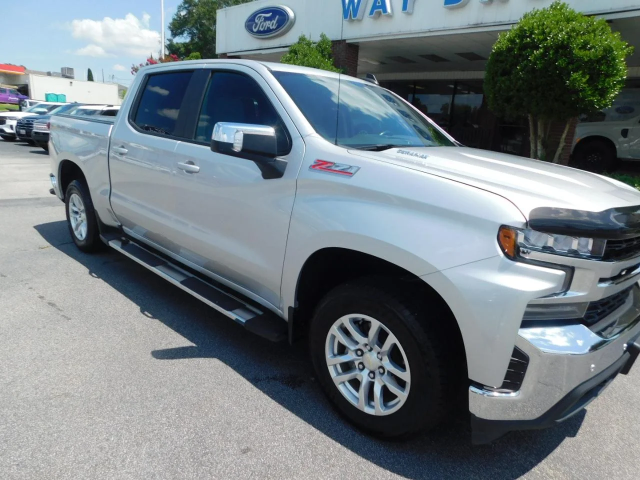 Used 2020 Silver Chevrolet 4WD CREW CAB 147 in LT image 2