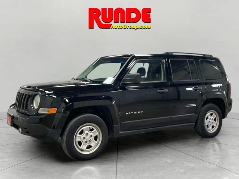 Used 2015 Black Clearcoat Jeep Sport image 1