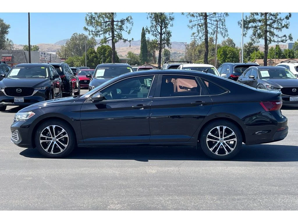 Used 2023 Deep Black Pearl Volkswagen Sport image 3