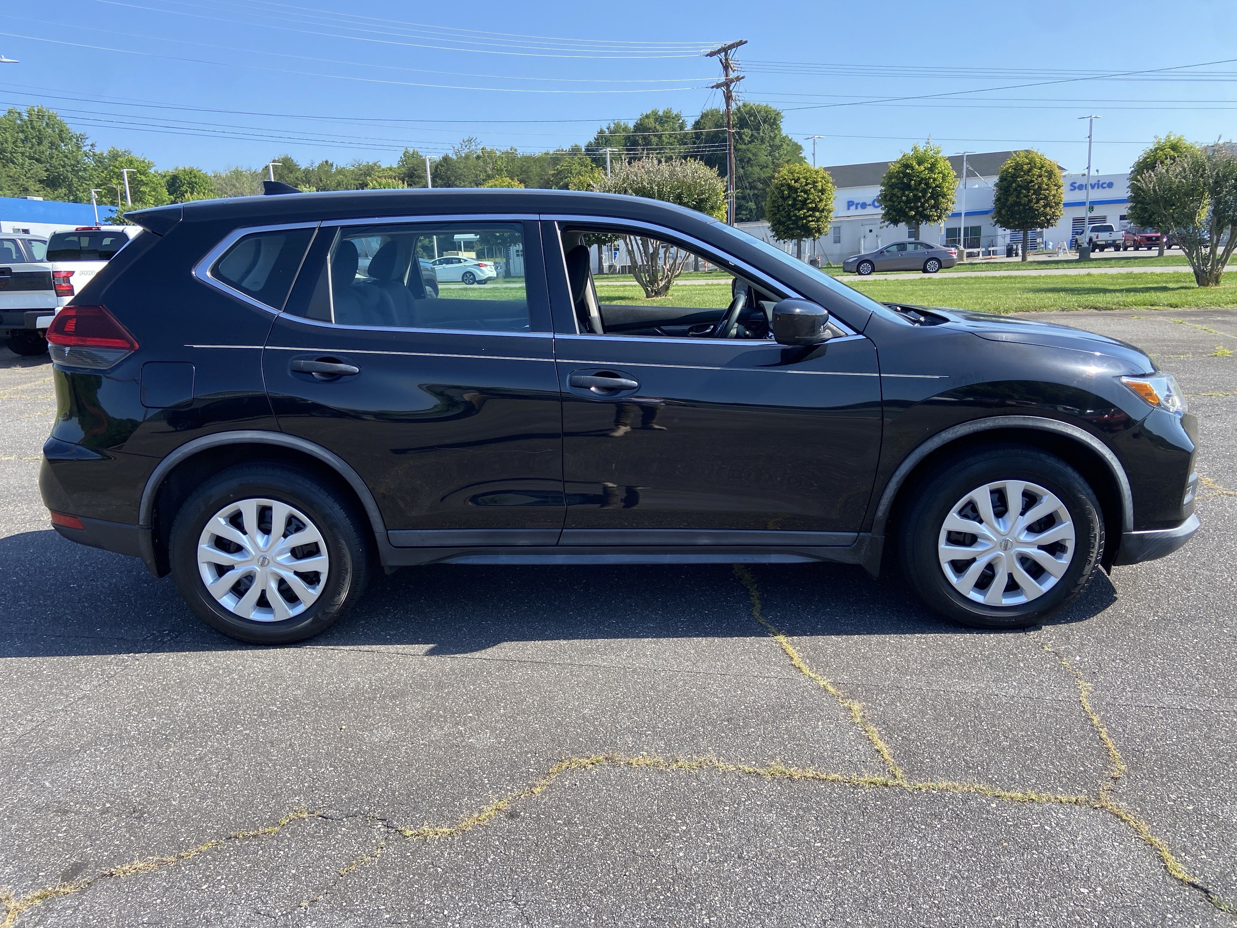 Used 2018 Magnetic Black Nissan S image 4