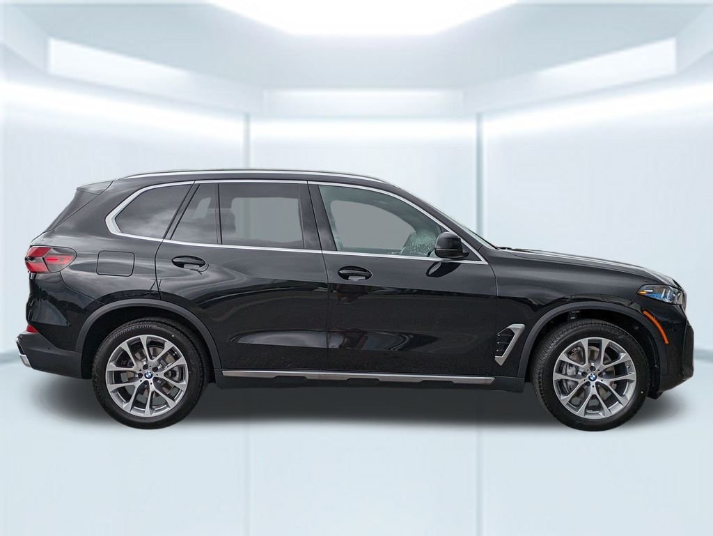 New 2026 Black Sapphire Metallic BMW sDrive40i image 6