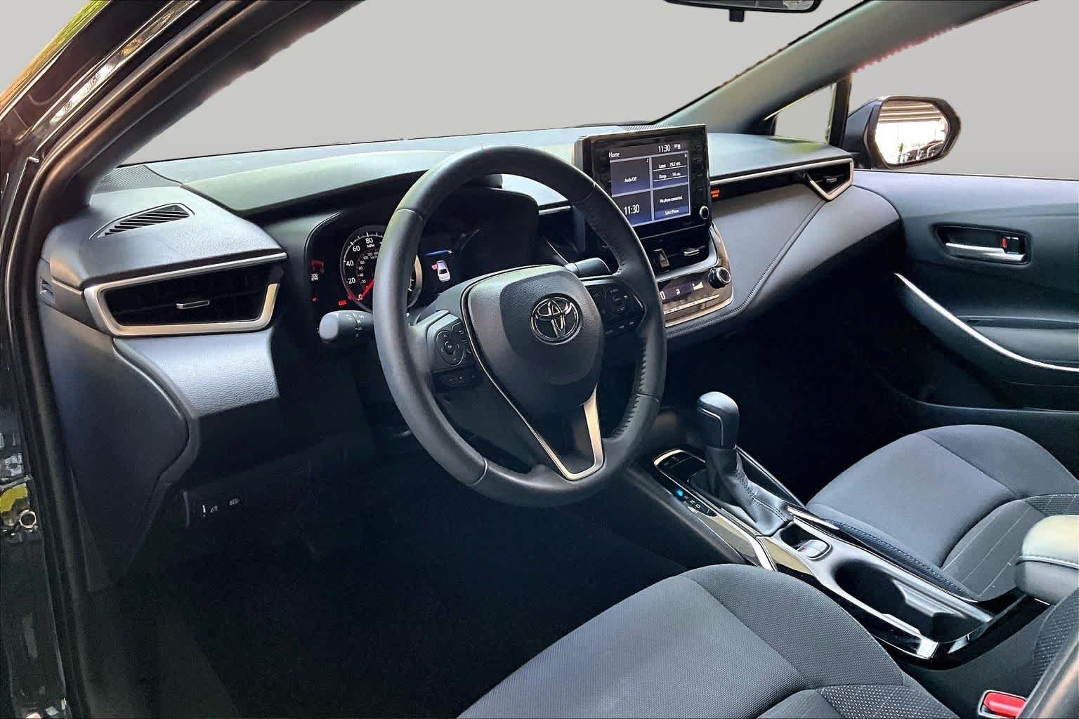 Used 2022 Black Sand Pearl Toyota SE image 17