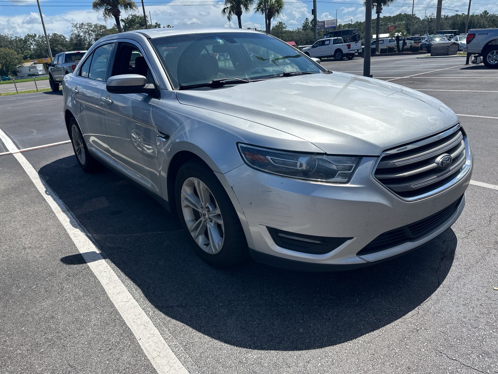 Used 2016 Ford Taurus SEL with VIN 1FAHP2E89GG142766 for sale in Spring Hill, FL