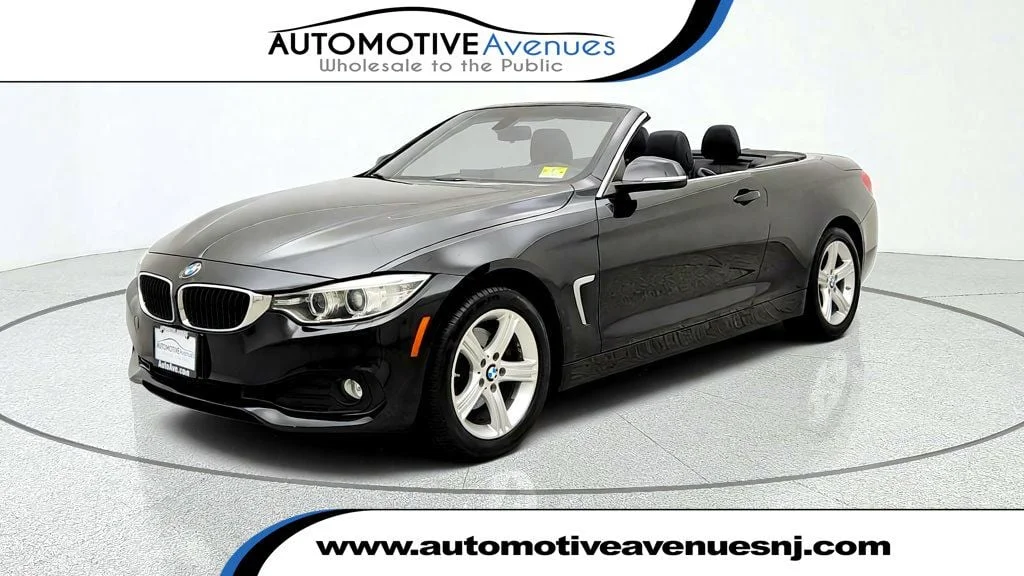 Used 2015 Black Sapphire Metallic BMW 428i xDrive image 1