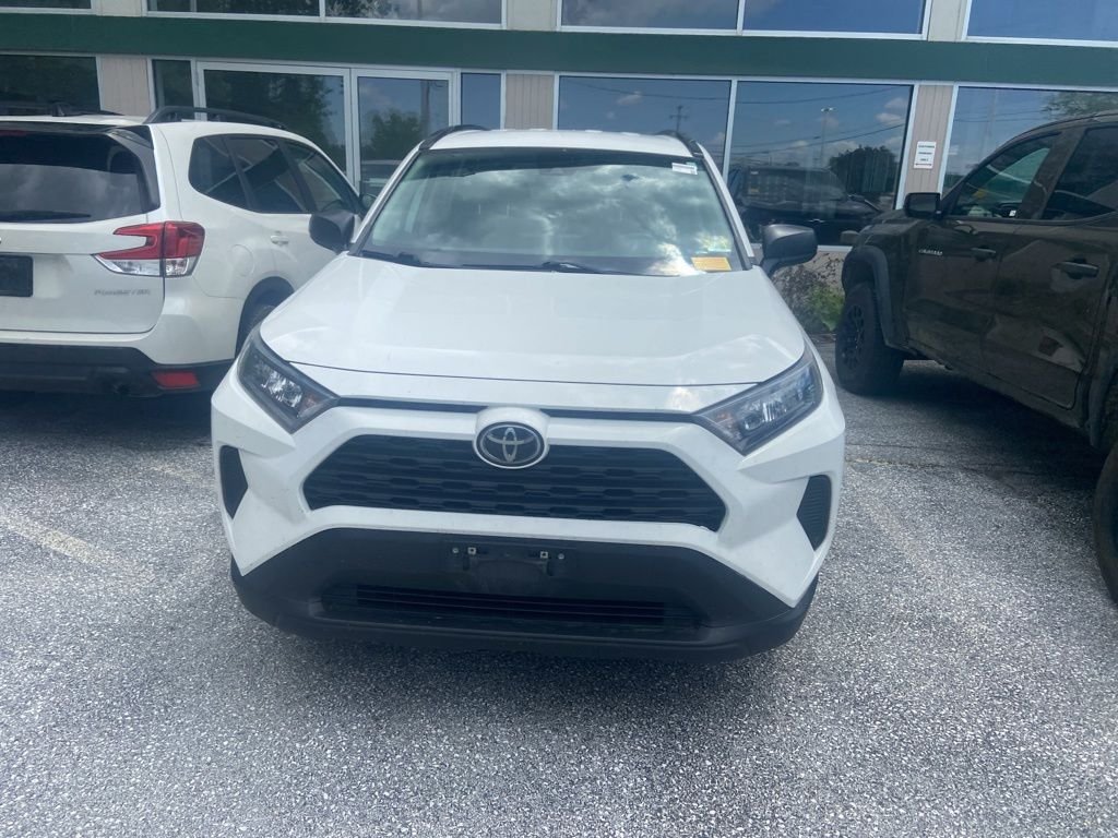 Used 2021 Super White Toyota LE image 2