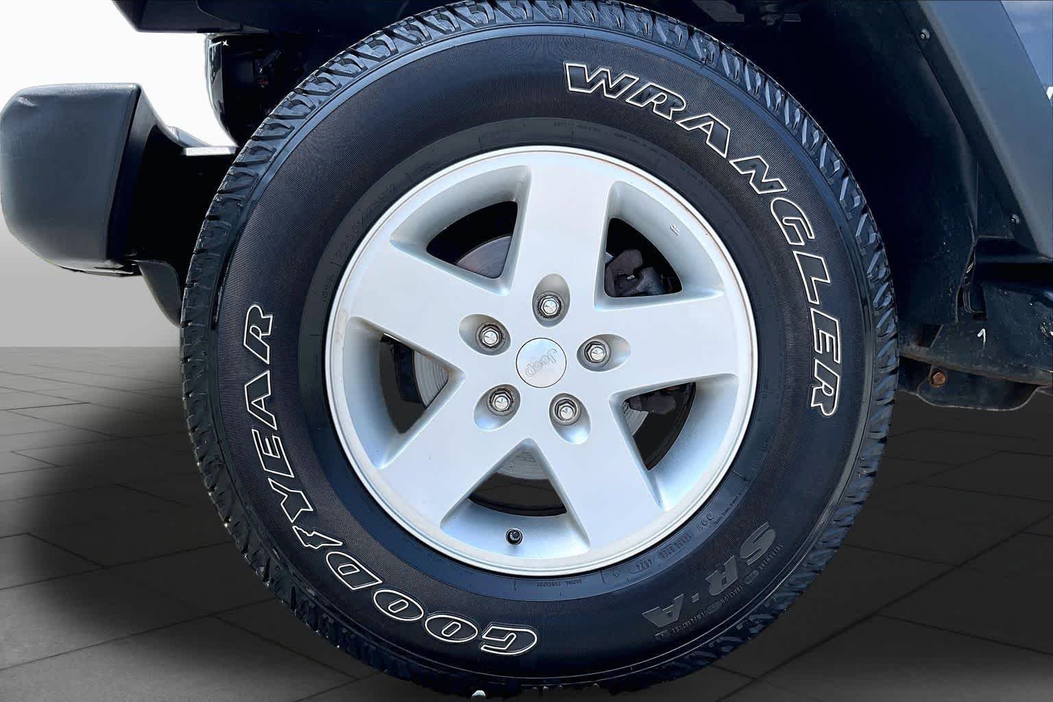 Used 2016 Black Clearcoat Jeep Sport image 11
