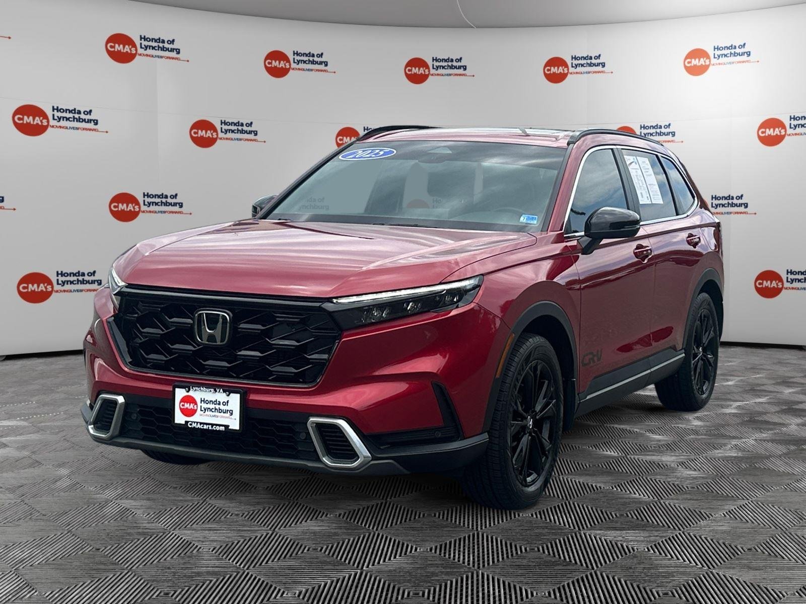 Used 2025 Radiant Red Metallic Honda Sport Touring image 1