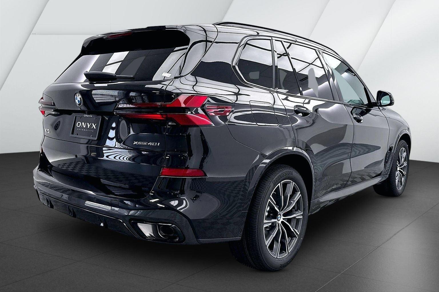 New 2026 Black Sapphire Metallic BMW xDrive40i image 6