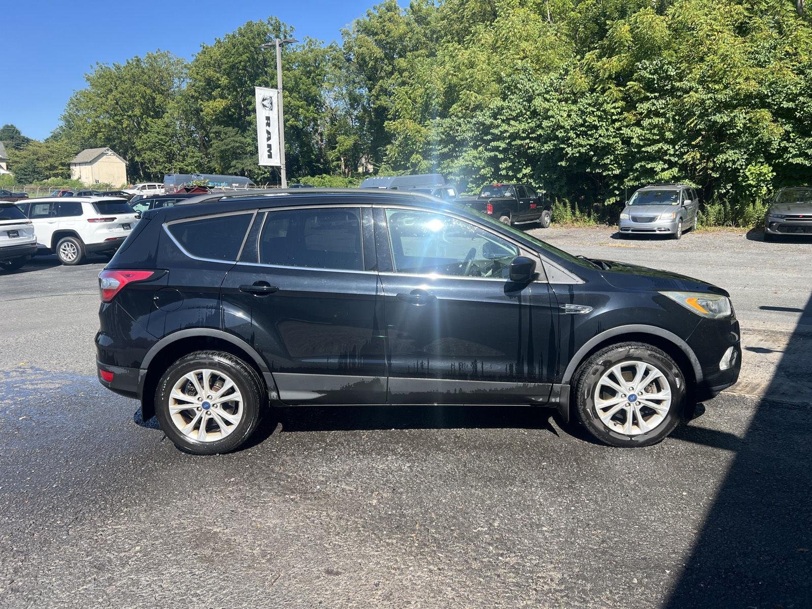 Used 2017 Shadow Black Ford SE image 2