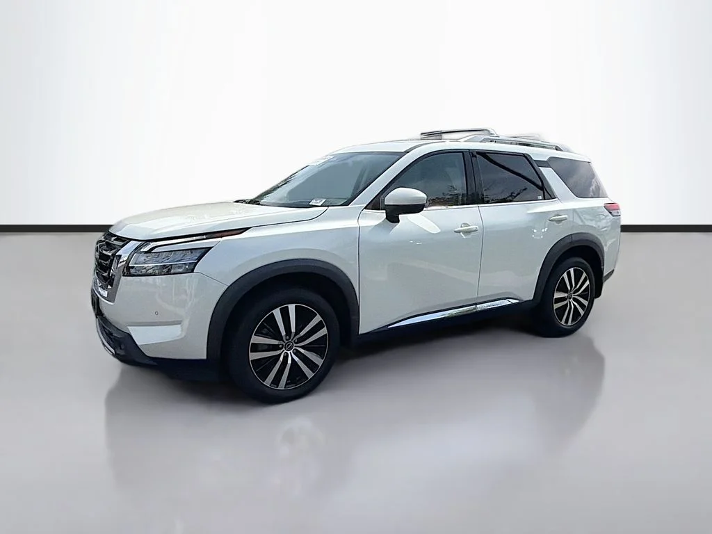 Used 2023 Pearl White Nissan Platinum image 1