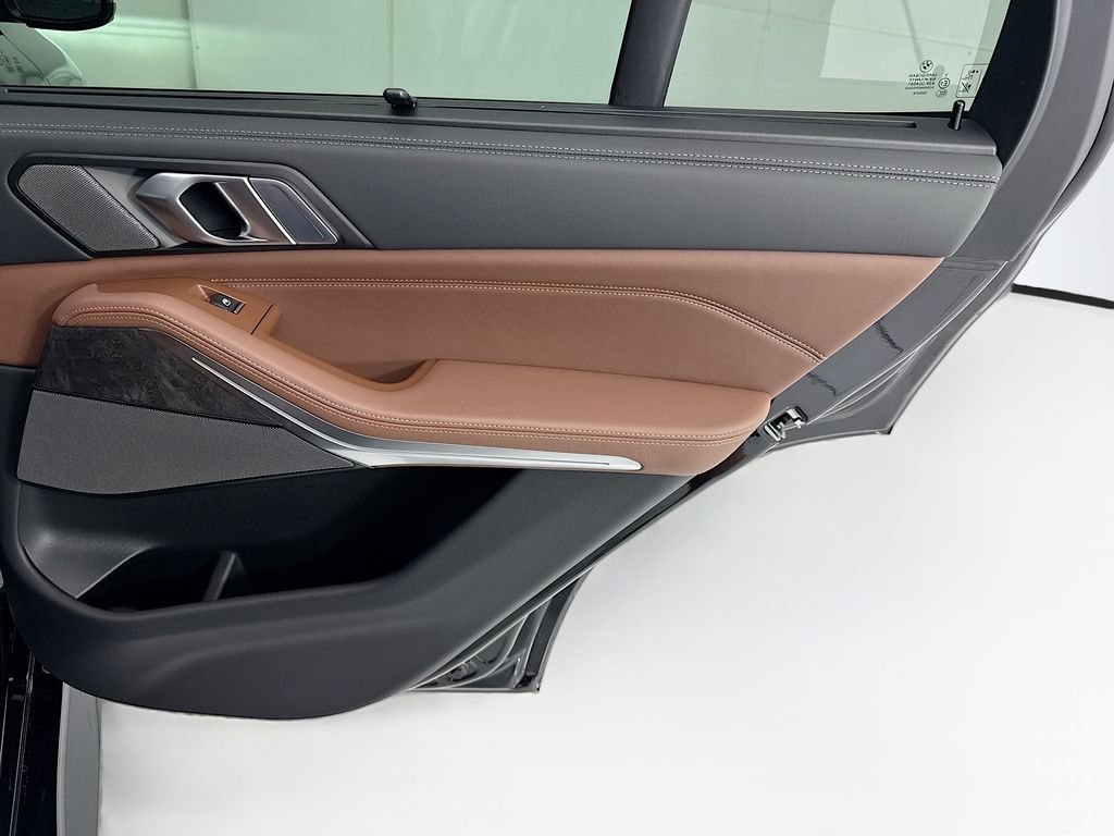 New 2026 Black Sapphire Metallic BMW M60i image 26