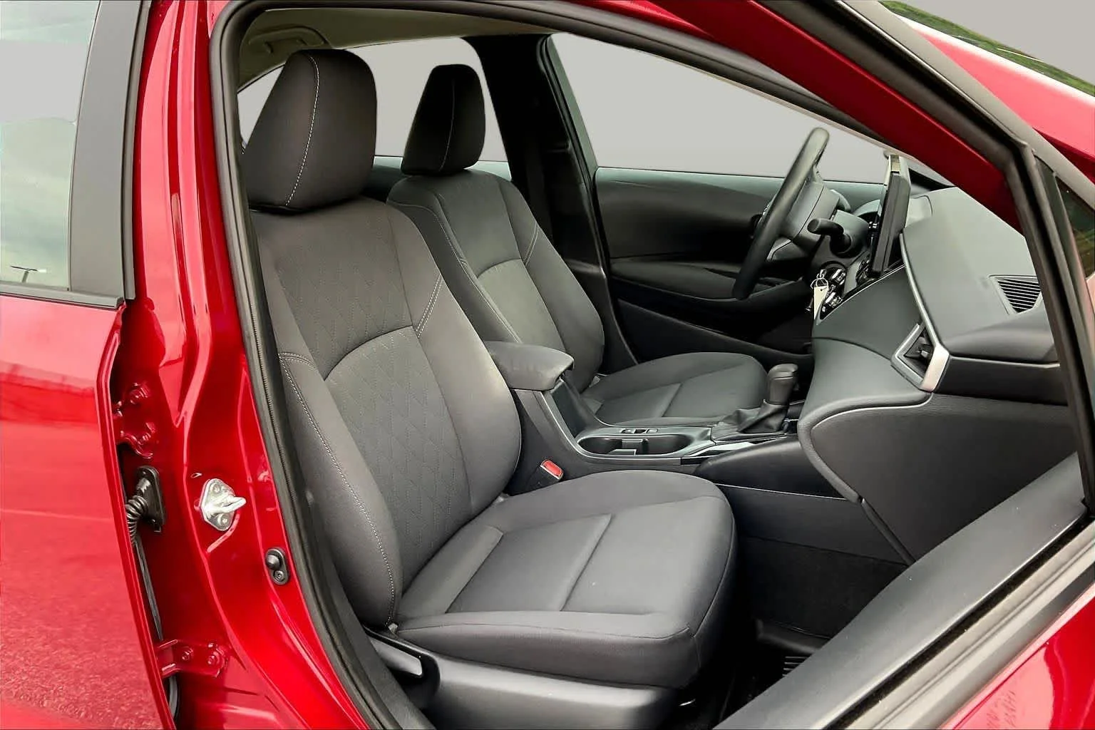 Used 2024 Ruby Flare Pearl Toyota LE image 9