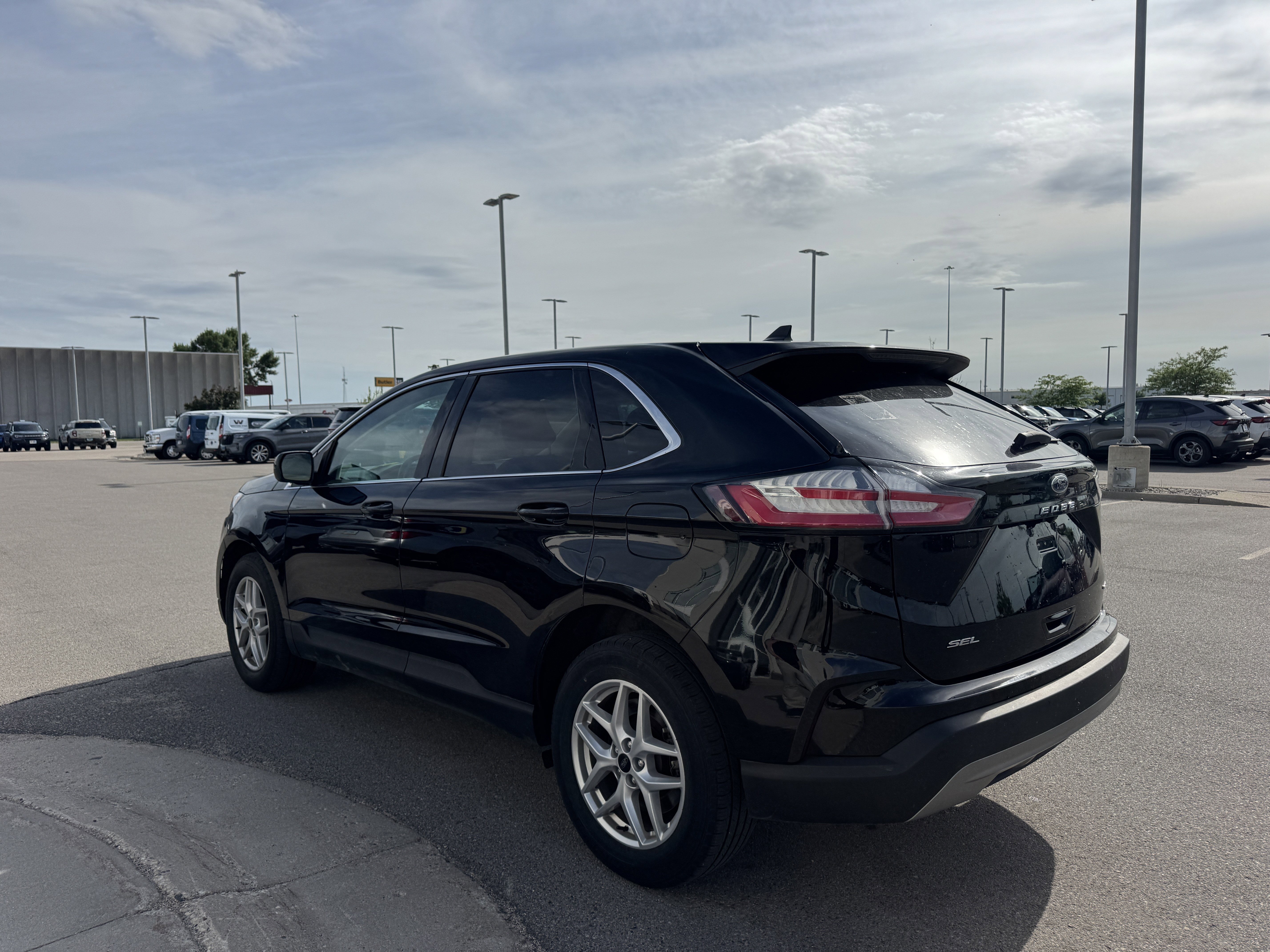 Certified Used 2024 Agate Black Metallic Ford SEL image 3
