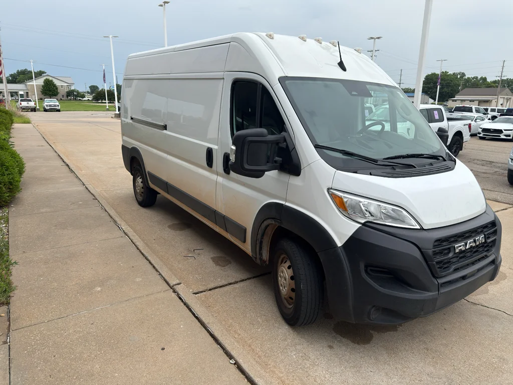 Used 2023 Bright White Clearcoat Ram High Roof 159WB image 4