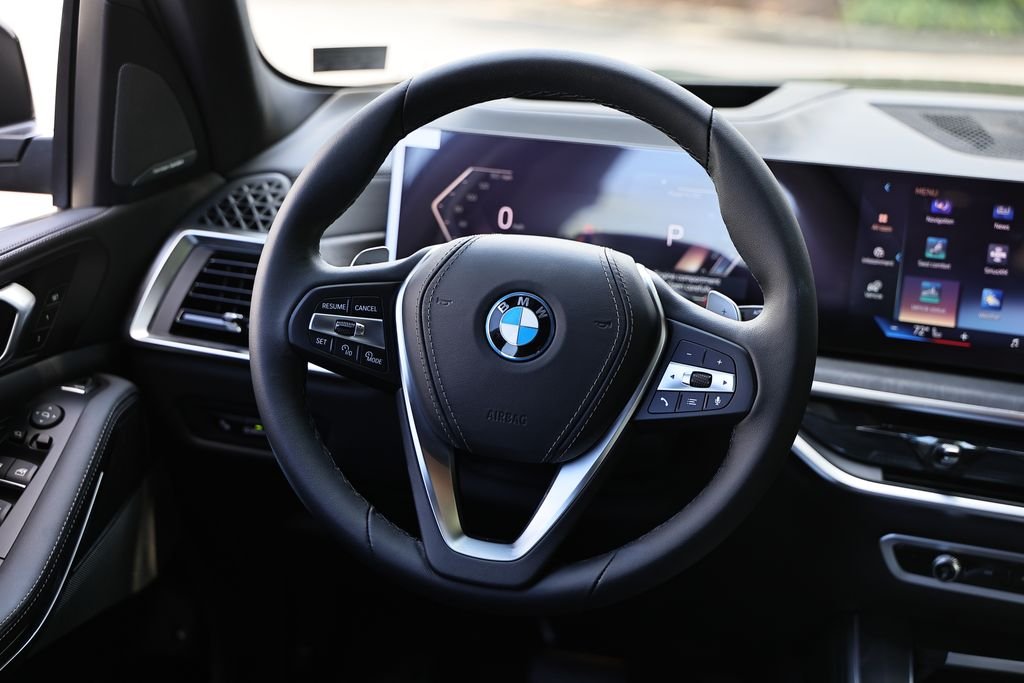 New 2026 Black Sapphire Metallic BMW xDrive50e image 28