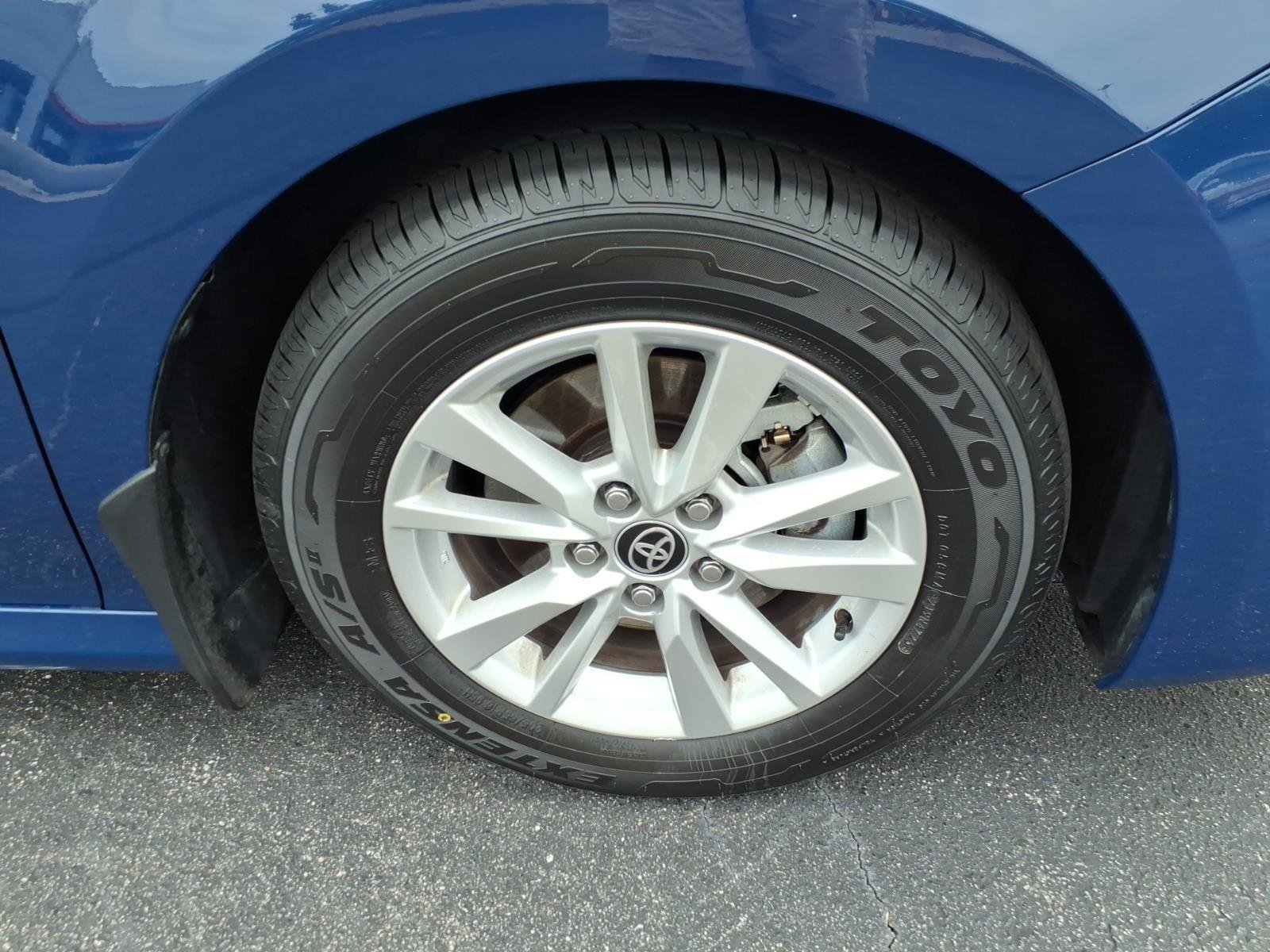 Used 2025 Reservoir Blue Toyota LE image 13