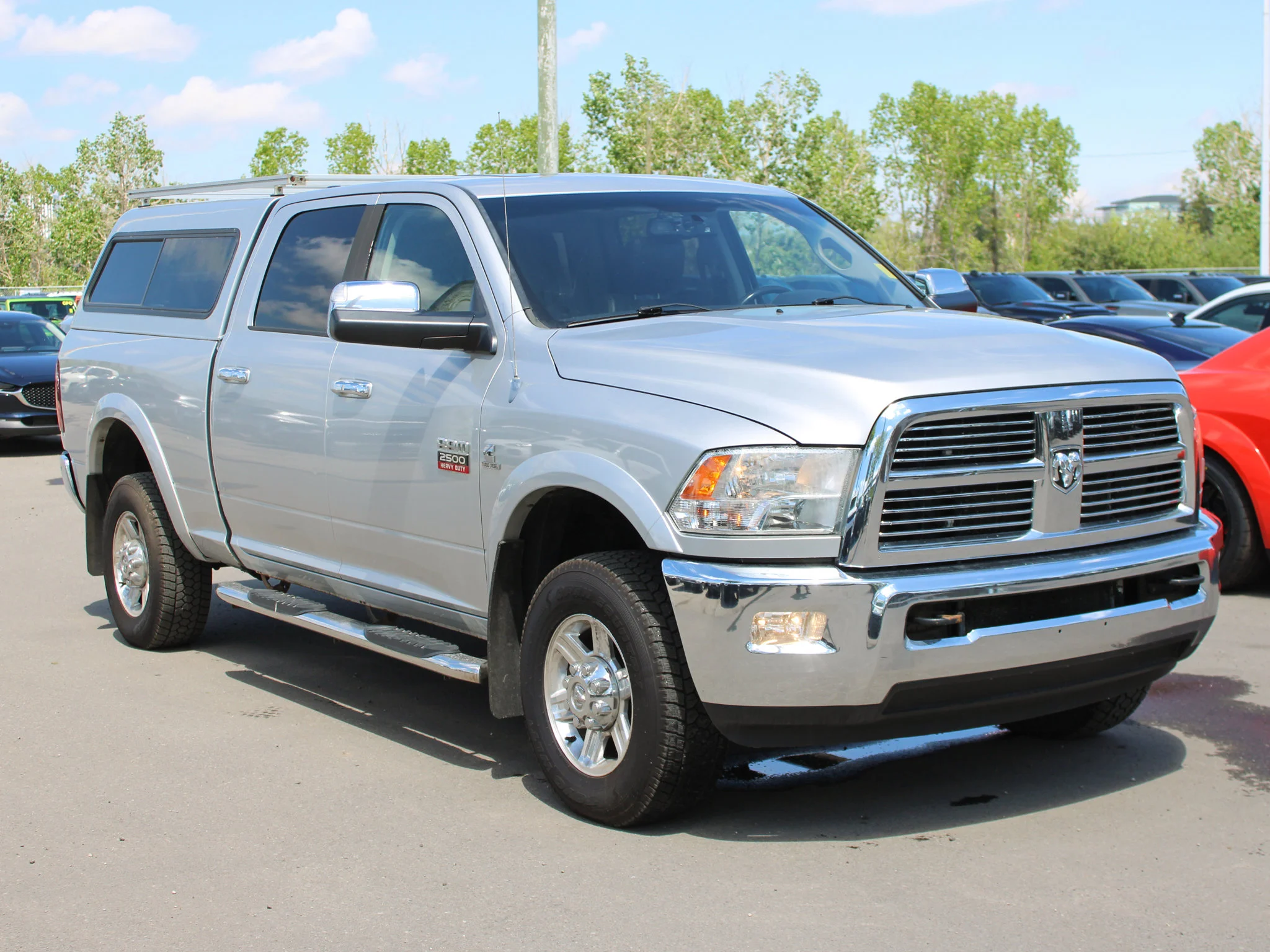 Used 2012 Silver RAM Laramie * Mechanic Special | Cummins | Heated Leather Seats | Canopy | Navigation image 7
