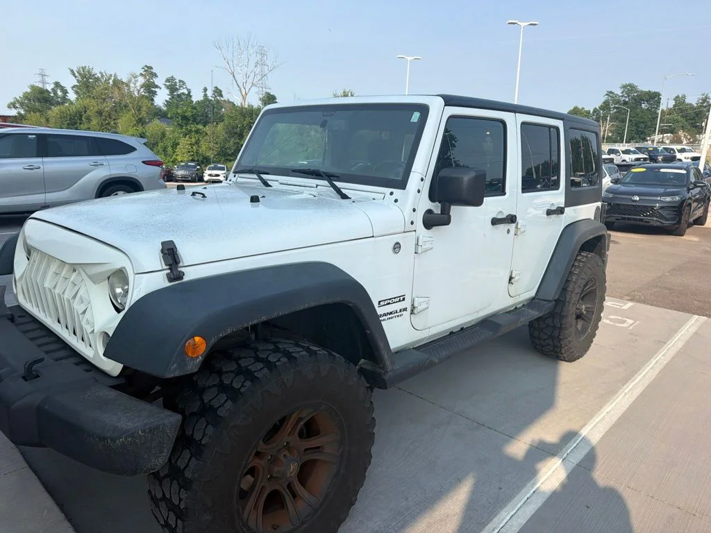 Used 2014 White Jeep Unlimited Sport image 2