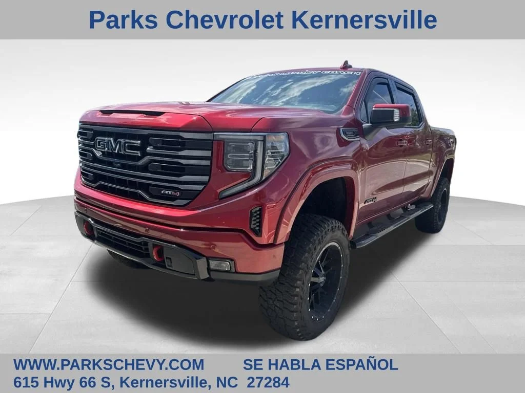 Used 2025 Volcanic Red Tintcoat GMC AT4 image 1