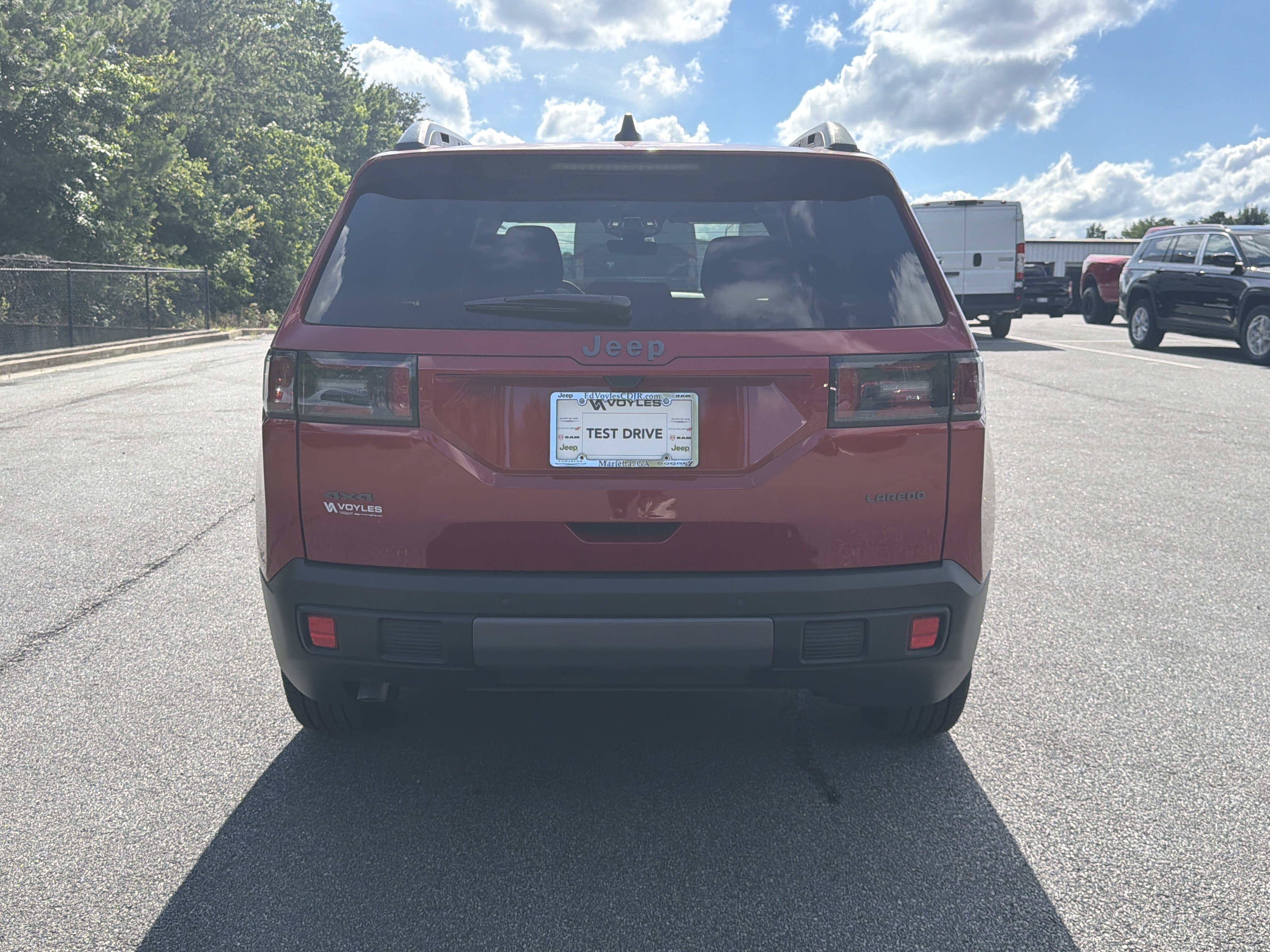 New 2026 Red Hot Pearlcoat Jeep Laredo image 7