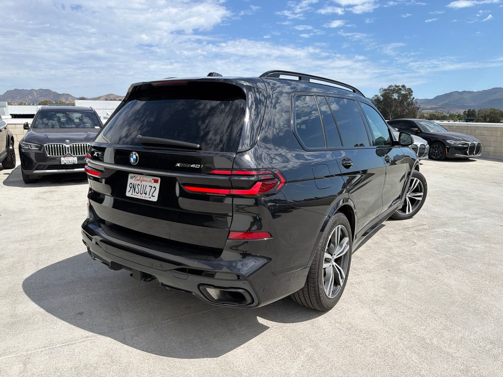 Certified Used 2024 Black Sapphire Metallic BMW xDrive40i image 4