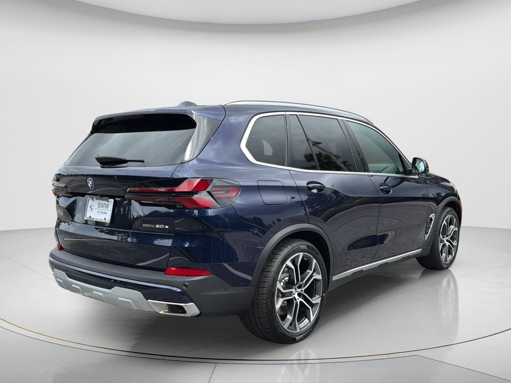 New 2026 Tanzanite Blue II Metallic BMW xDrive50e image 10