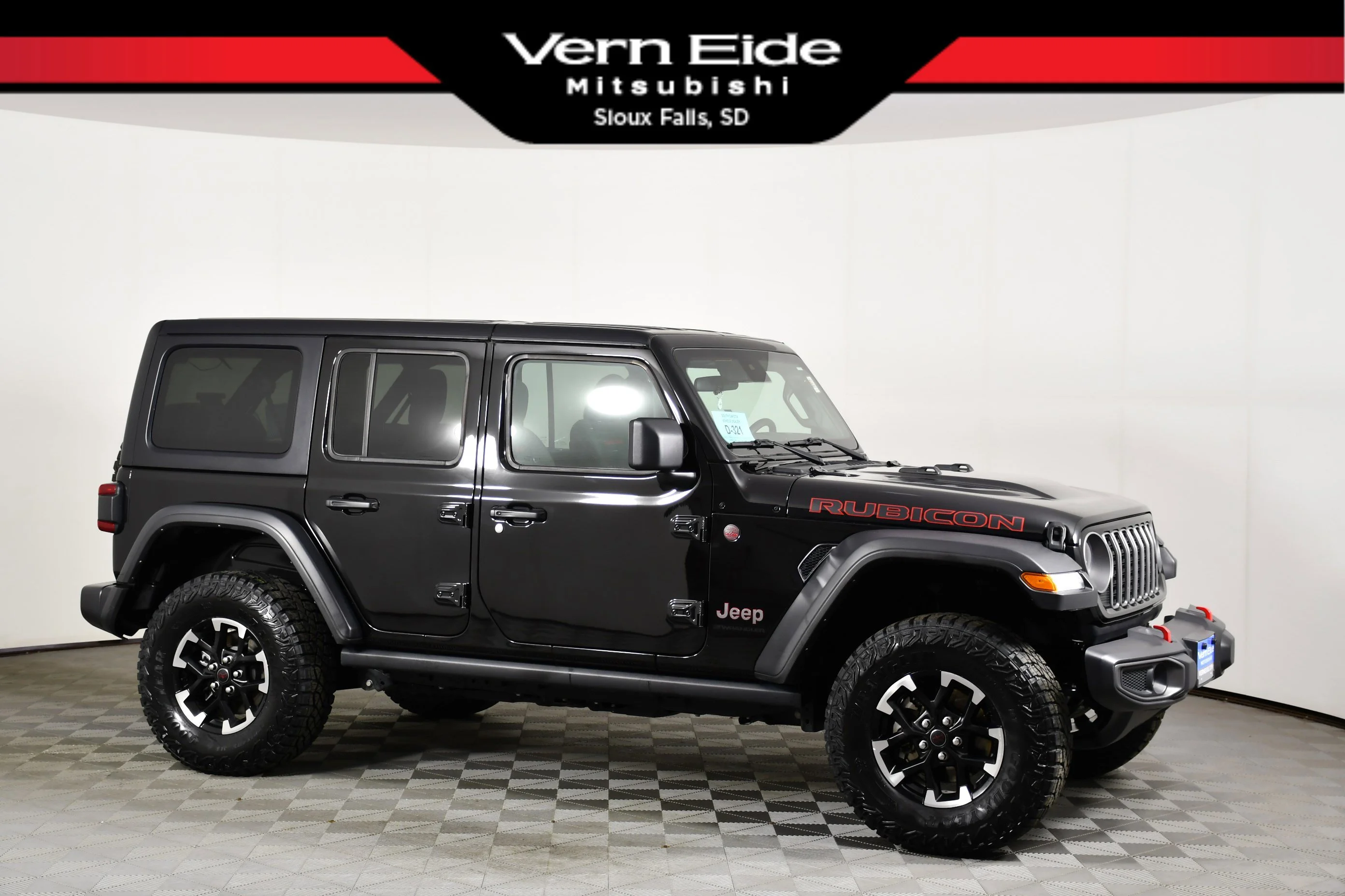 Used 2025 Black Clearcoat Jeep Rubicon image 1